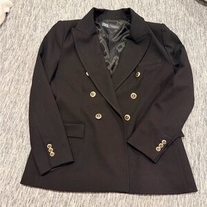 Zara black double-breasted blazer featuring distinctive gold crest buttons